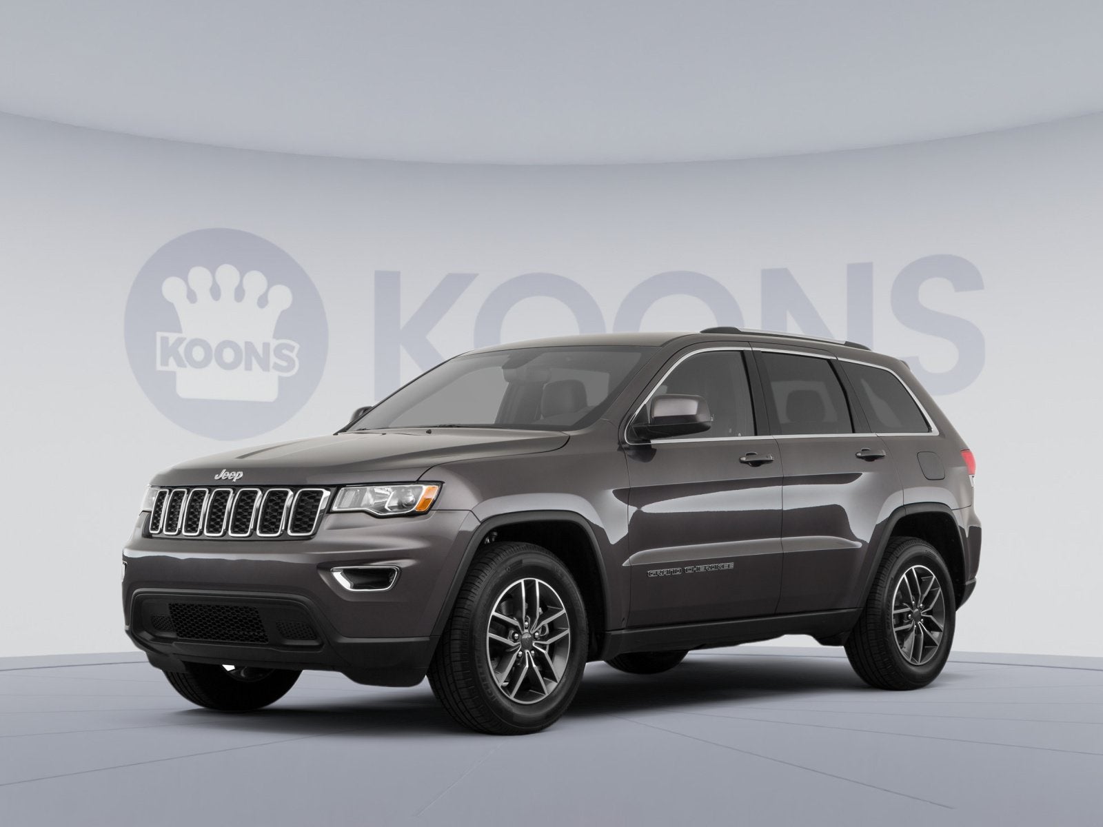 2019 Jeep Grand Cherokee Laredo E in Granite Crystal Metallic Clearcoat — front three-quarter view