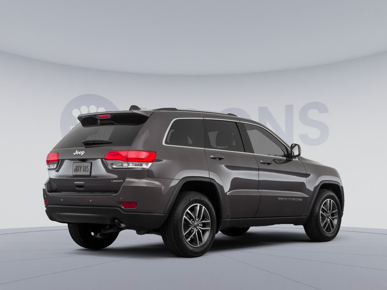 2019 Jeep Grand Cherokee — rear three-quarter view