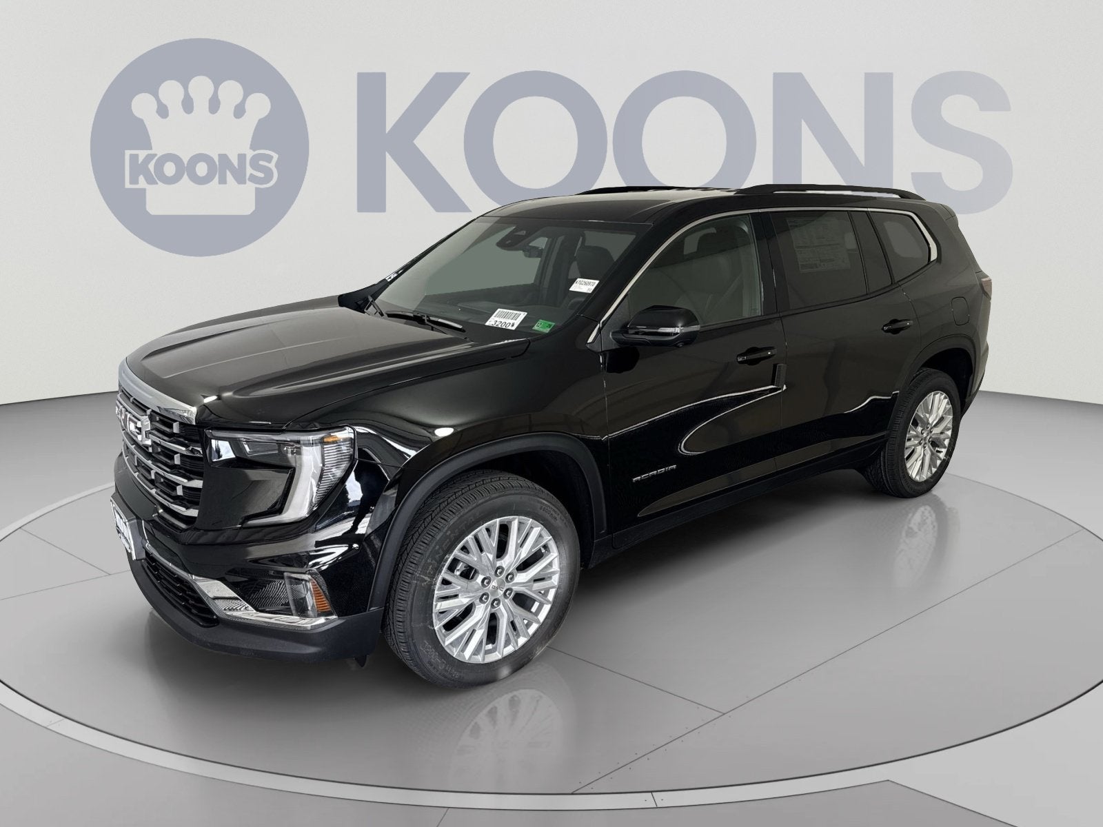 2026 GMC Acadia Elevation in Ebony Twilight Metallic — front three-quarter view