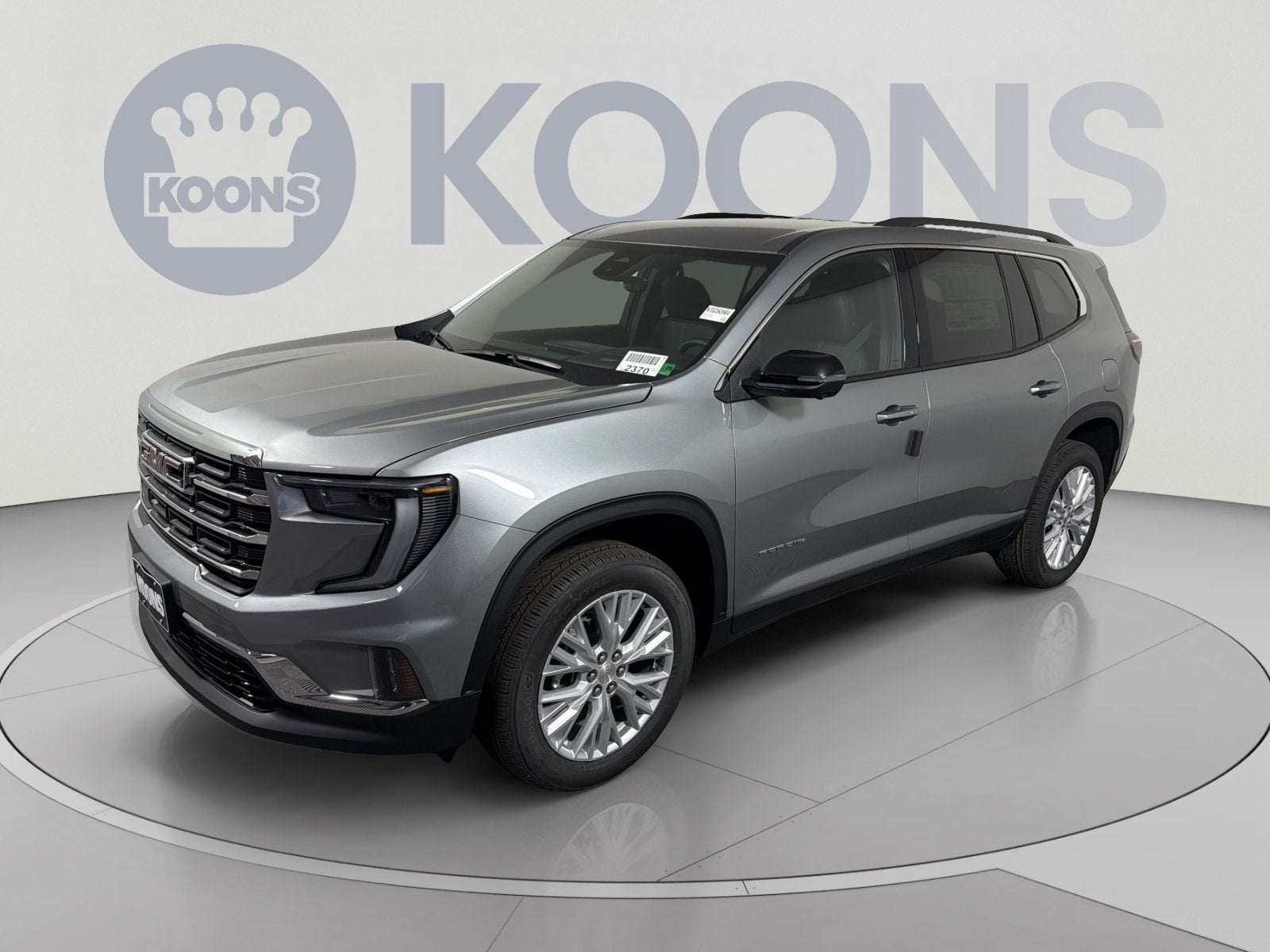 2026 GMC Acadia Elevation in Sterling Metallic — front three-quarter view