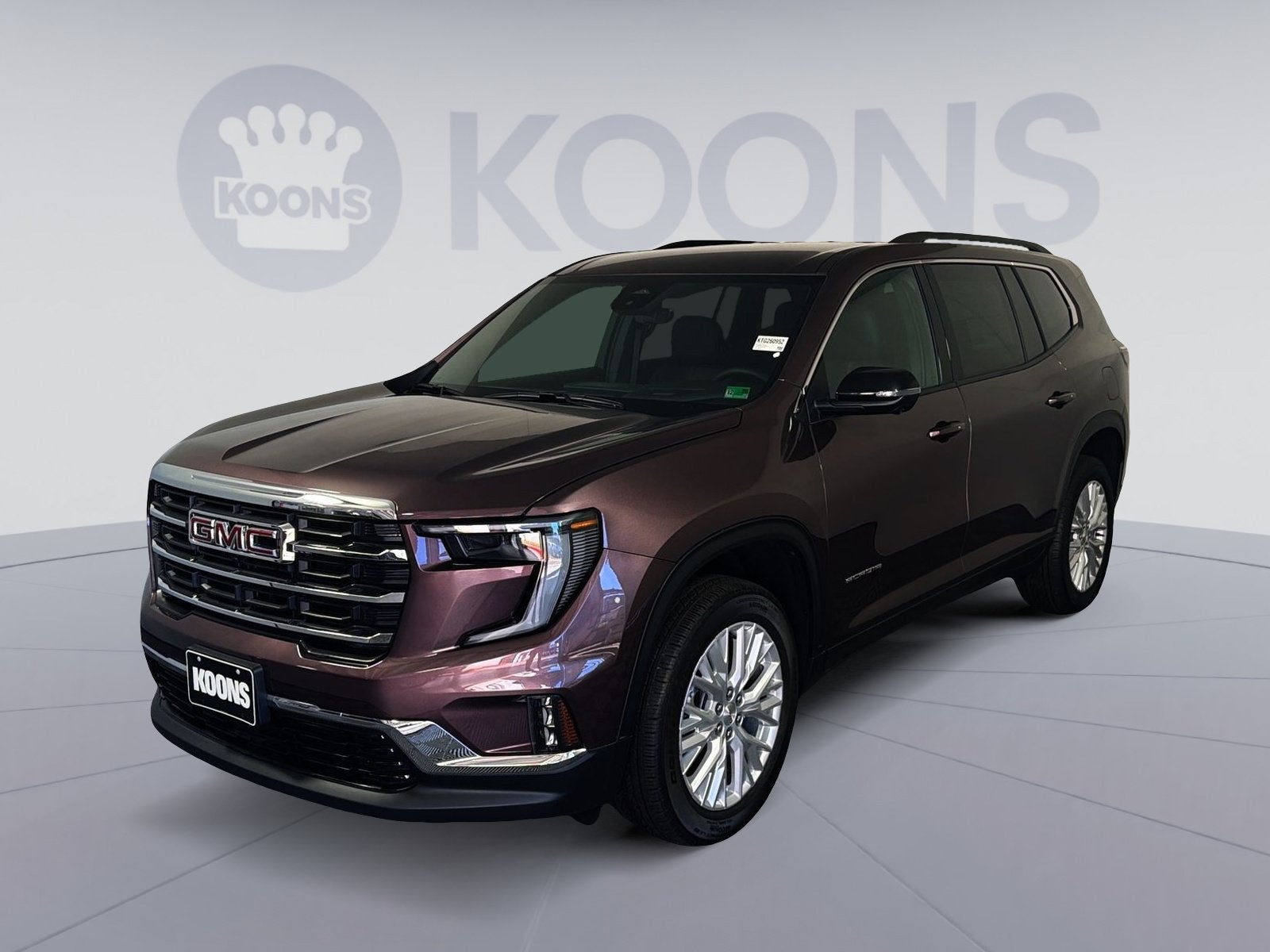2026 GMC Acadia Elevation in Crystal Metallic — front three-quarter view