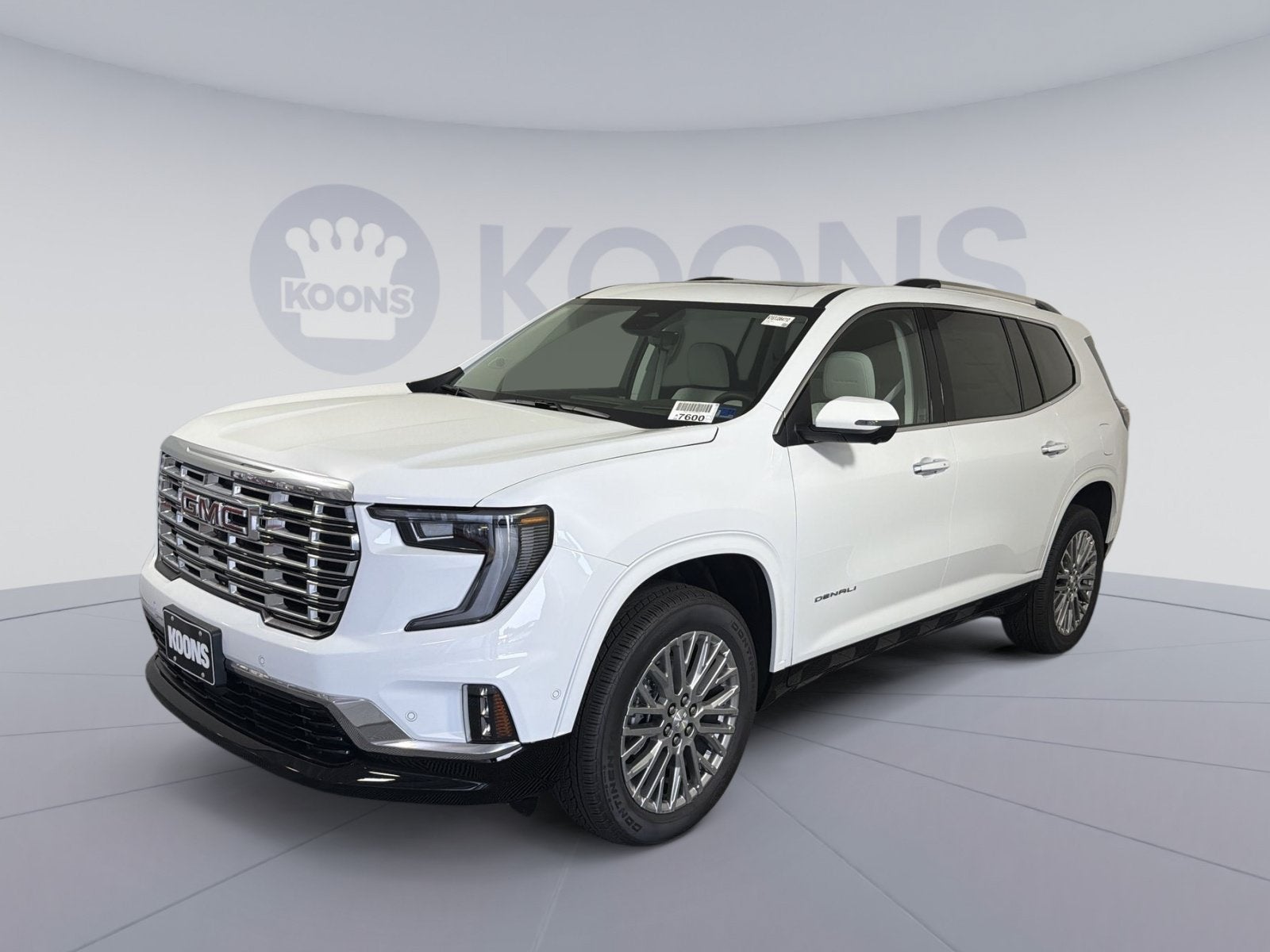 2026 GMC Acadia Denali in Summit White — front three-quarter view