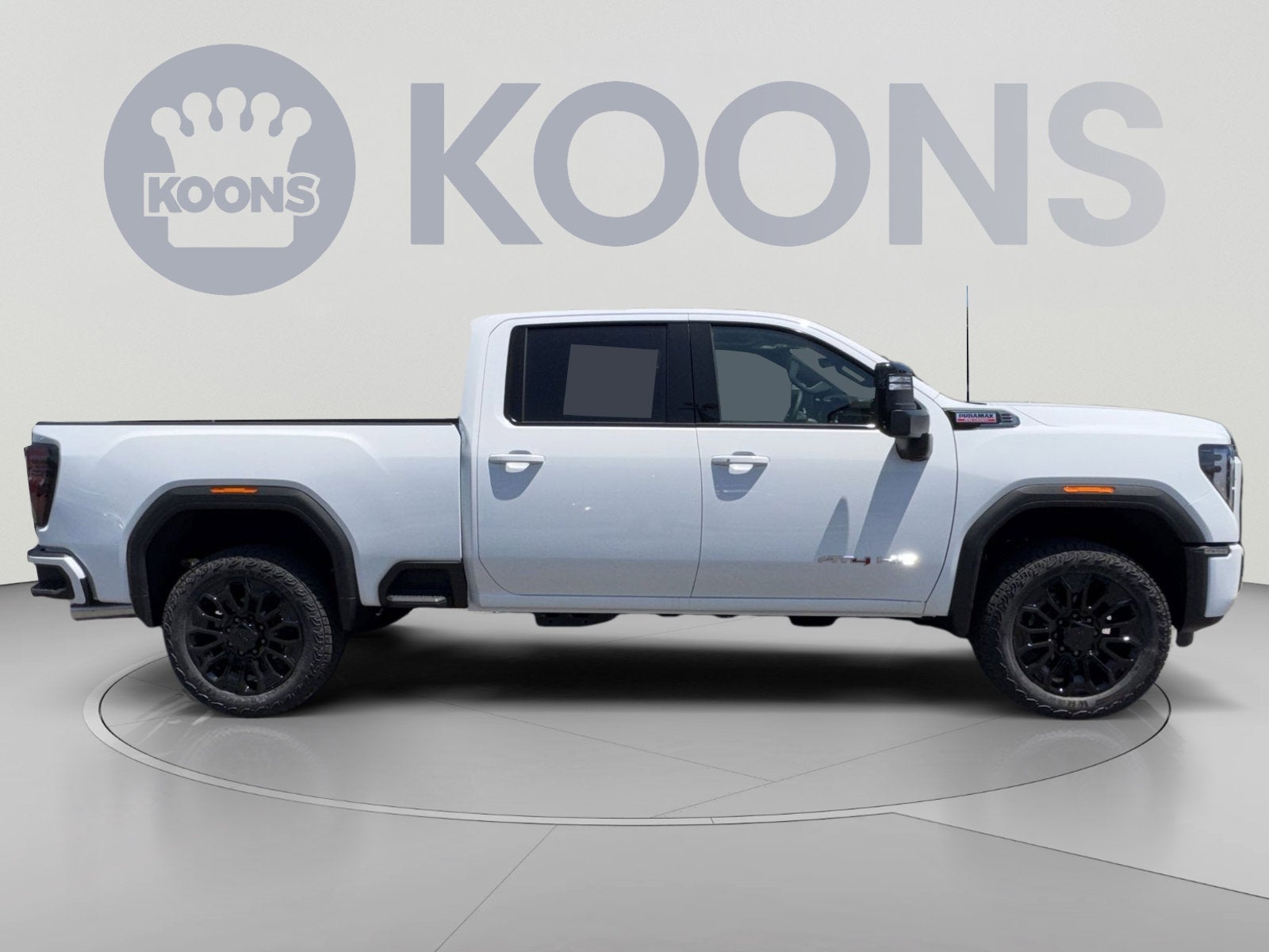 2026 GMC Sierra 2500 HD AT4 in Summit White — front three-quarter view