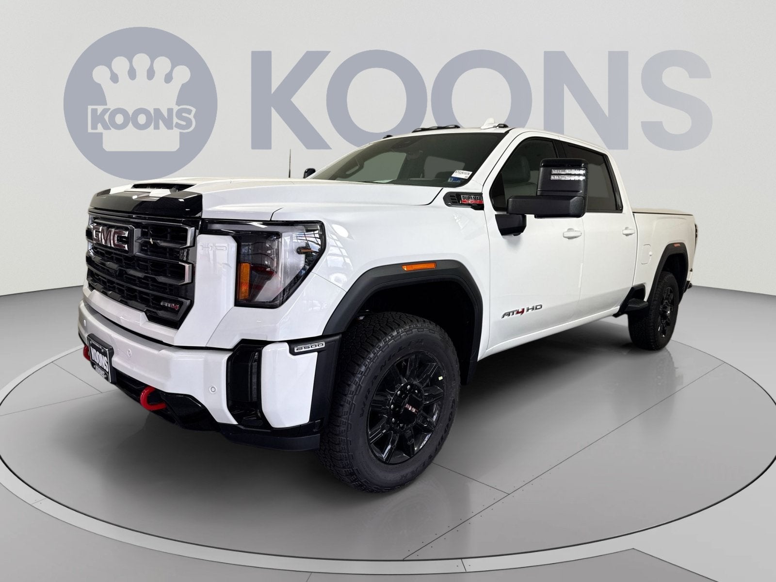 2026 GMC Sierra 2500 HD AT4 in Summit White — front three-quarter view