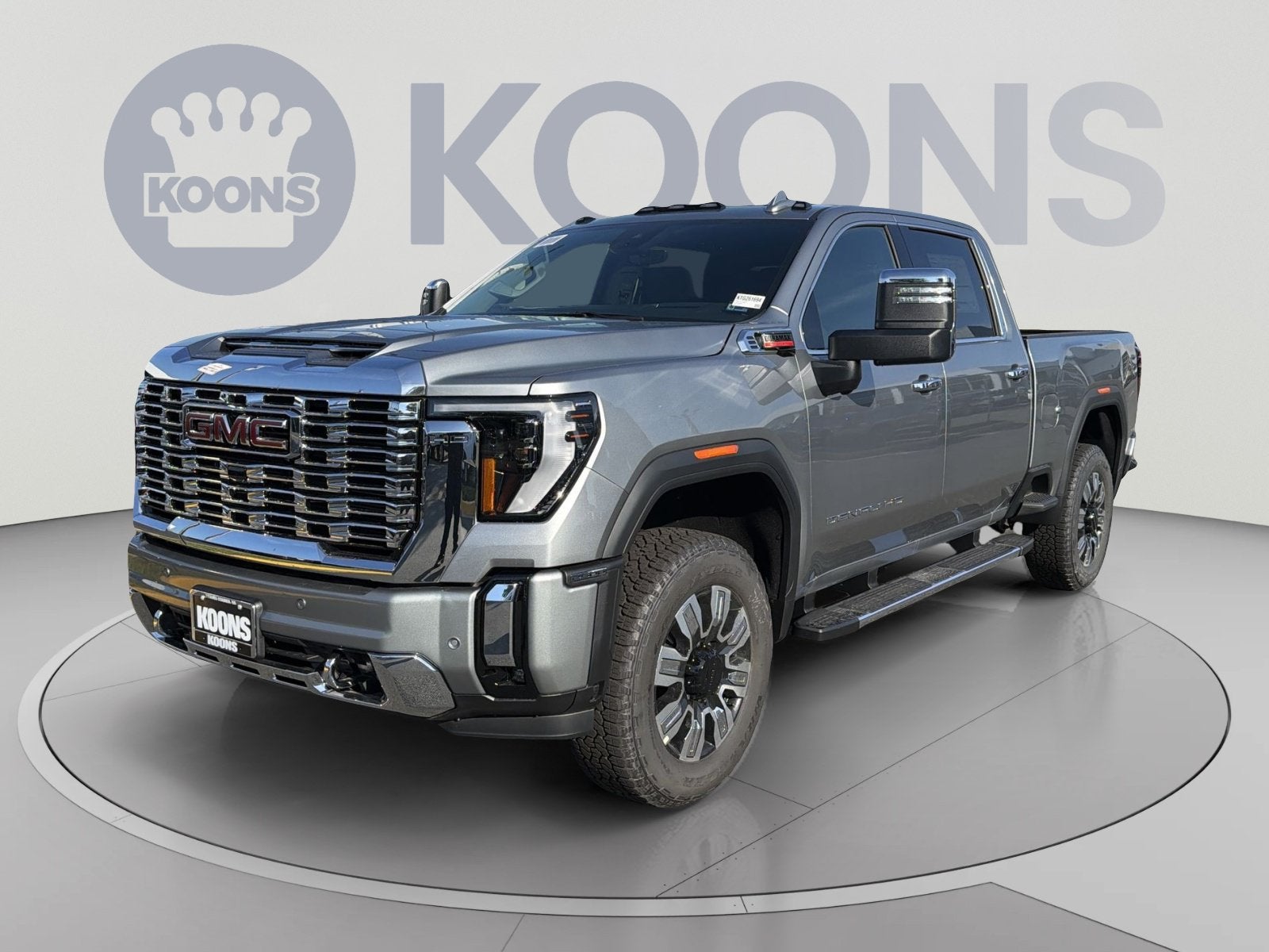 2026 GMC Sierra 2500 HD Denali in Sterling Metallic — front three-quarter view