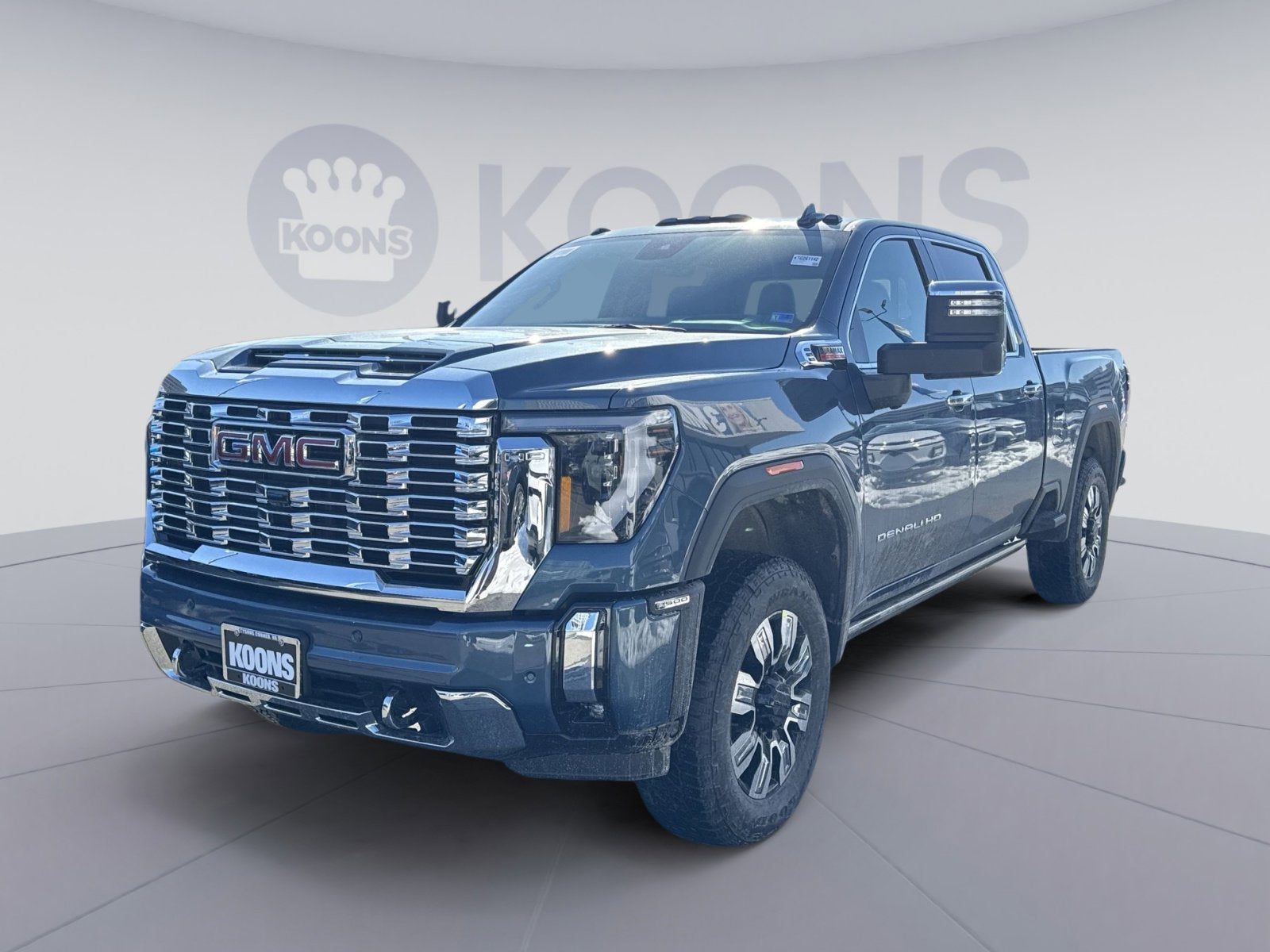 2026 GMC Sierra 2500 HD Denali in Downpour Metallic — front three-quarter view