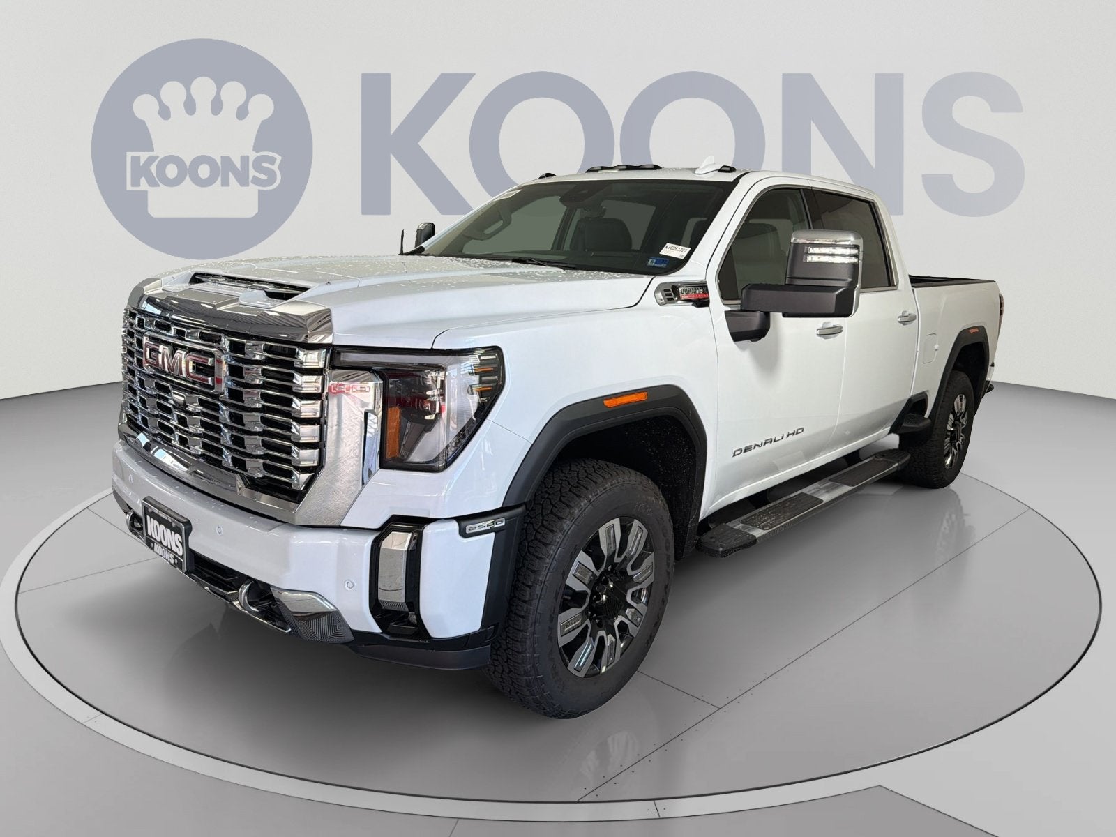 2026 GMC Sierra 2500 HD Denali in Glacier White Tricoat — front three-quarter view