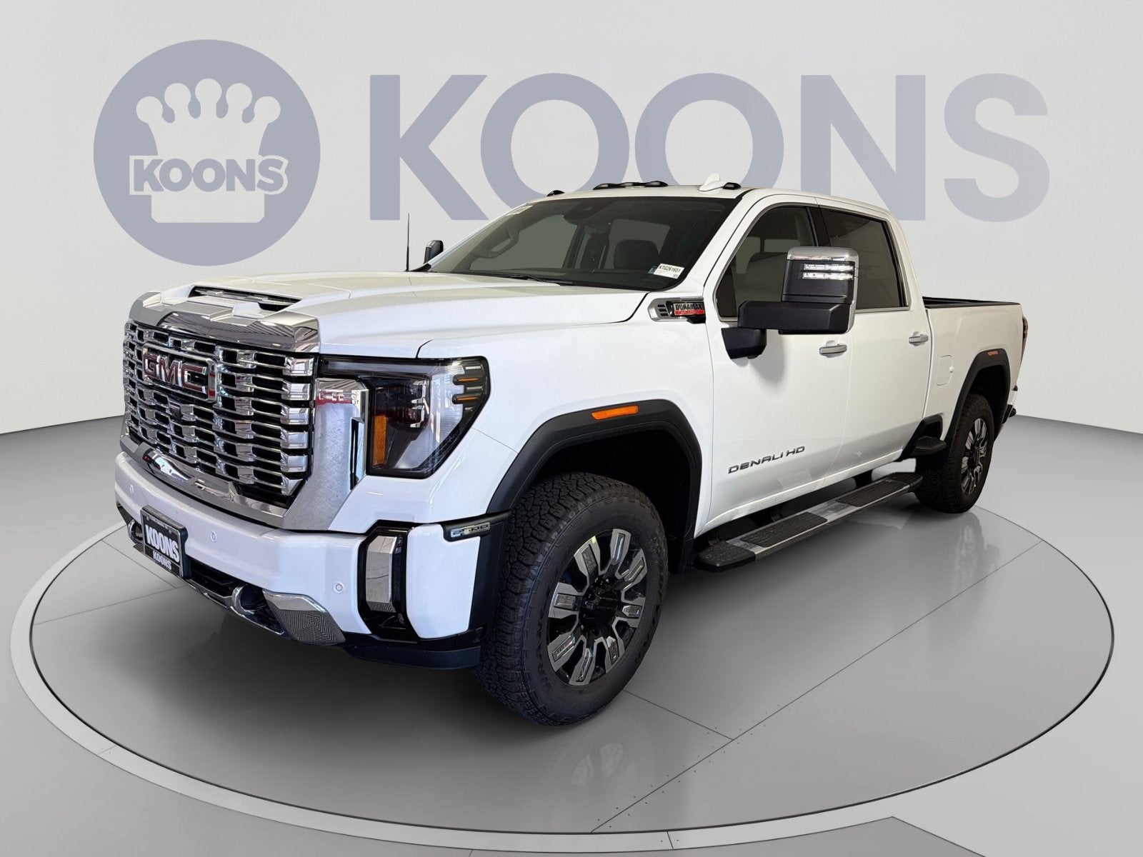 2026 GMC Sierra 2500 HD Denali in Summit White — front three-quarter view