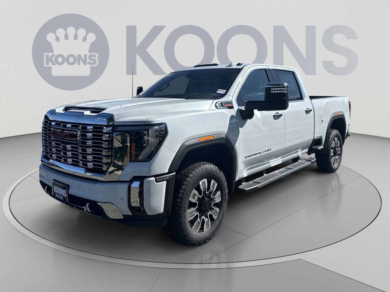 2026 GMC Sierra 2500 HD Denali in Glacier White Tricoat — front three-quarter view