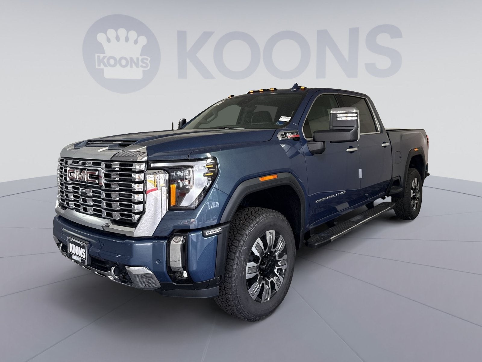 2026 GMC Sierra 2500 HD Denali in Downpour Metallic — front three-quarter view