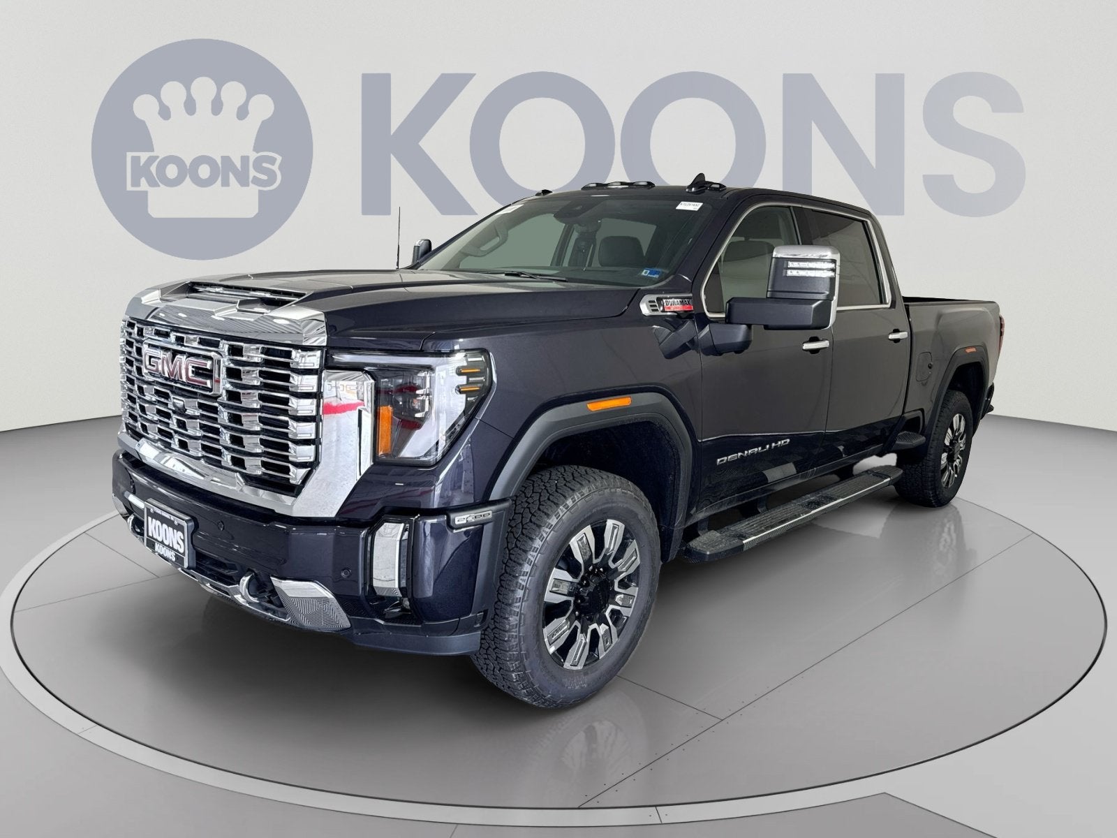 2026 GMC Sierra 2500 HD Denali in Titanium Rush Metallic — front three-quarter view