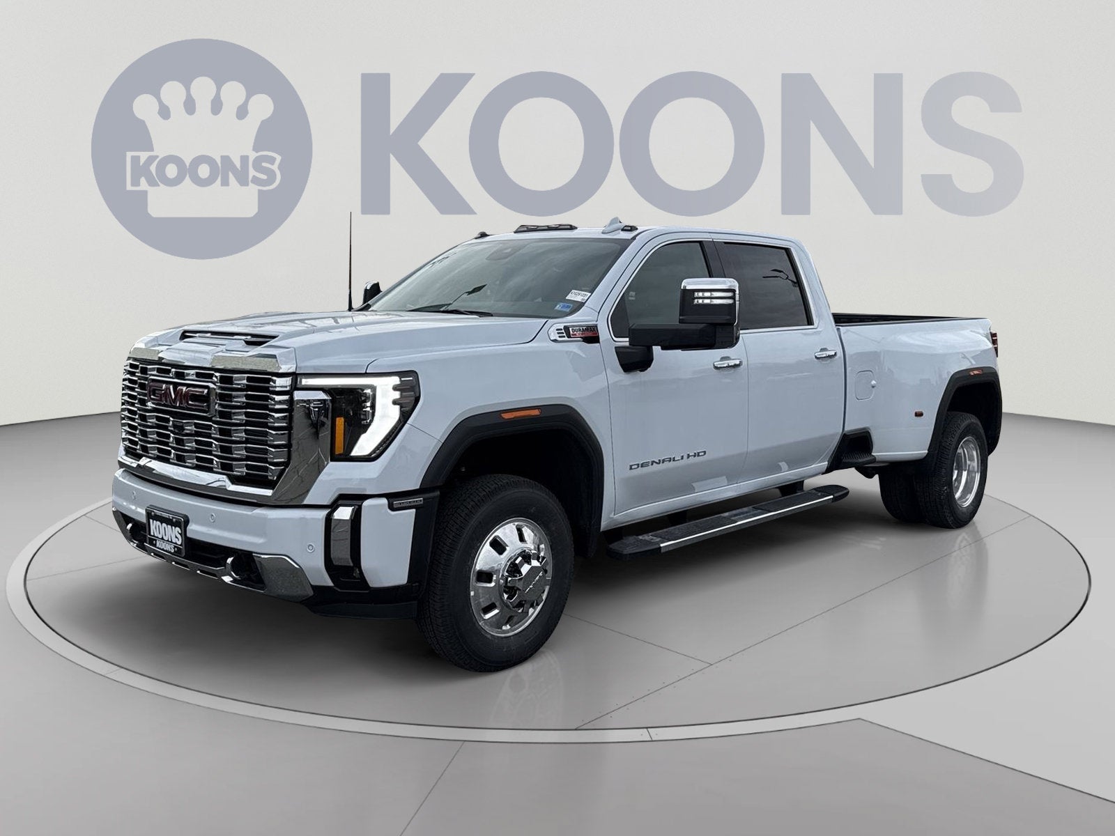 2026 GMC Sierra 3500 HD Denali DRW in Glacier White Tricoat — front three-quarter view