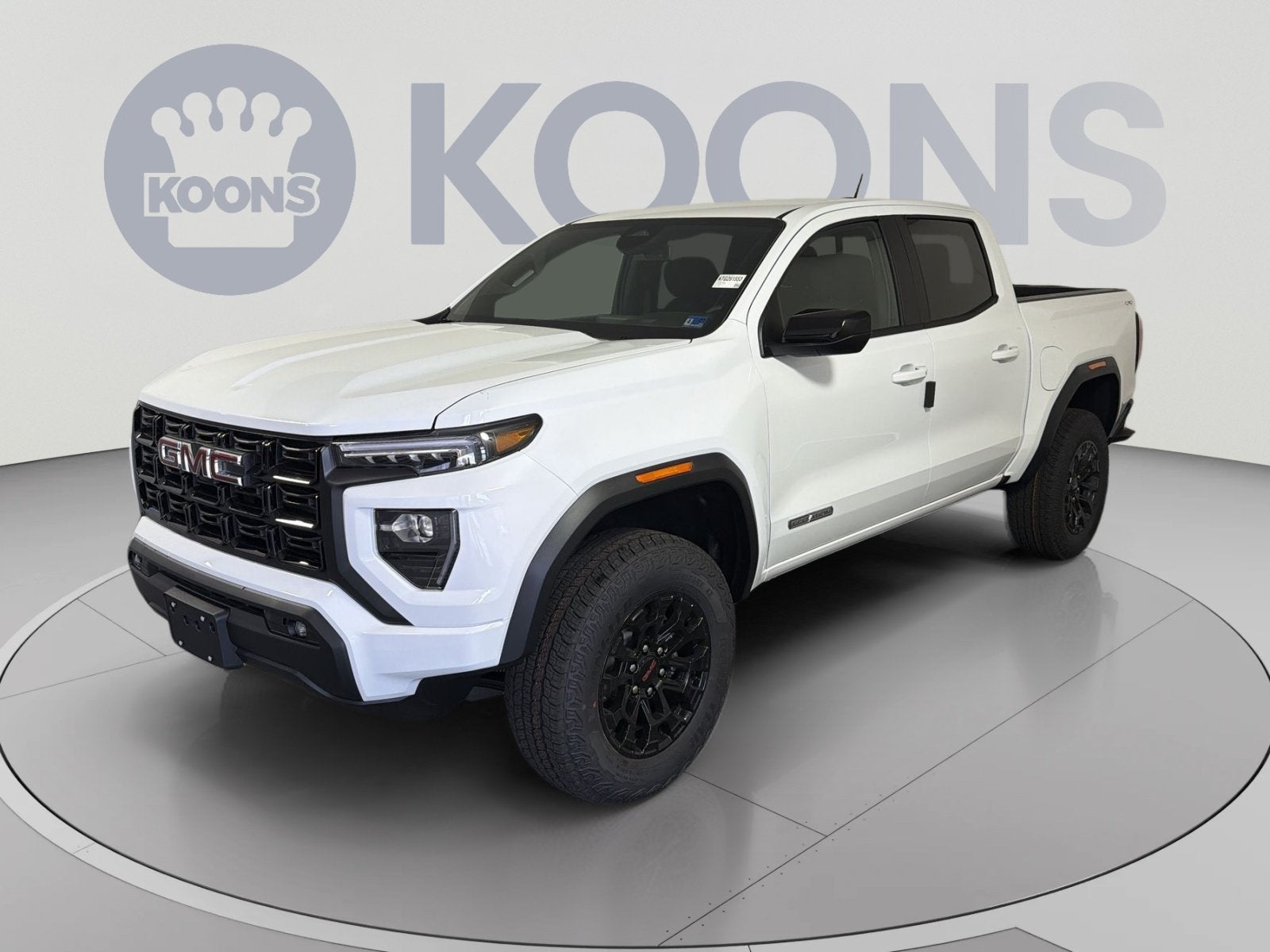 2026 GMC Canyon Elevation in Summit White — front three-quarter view