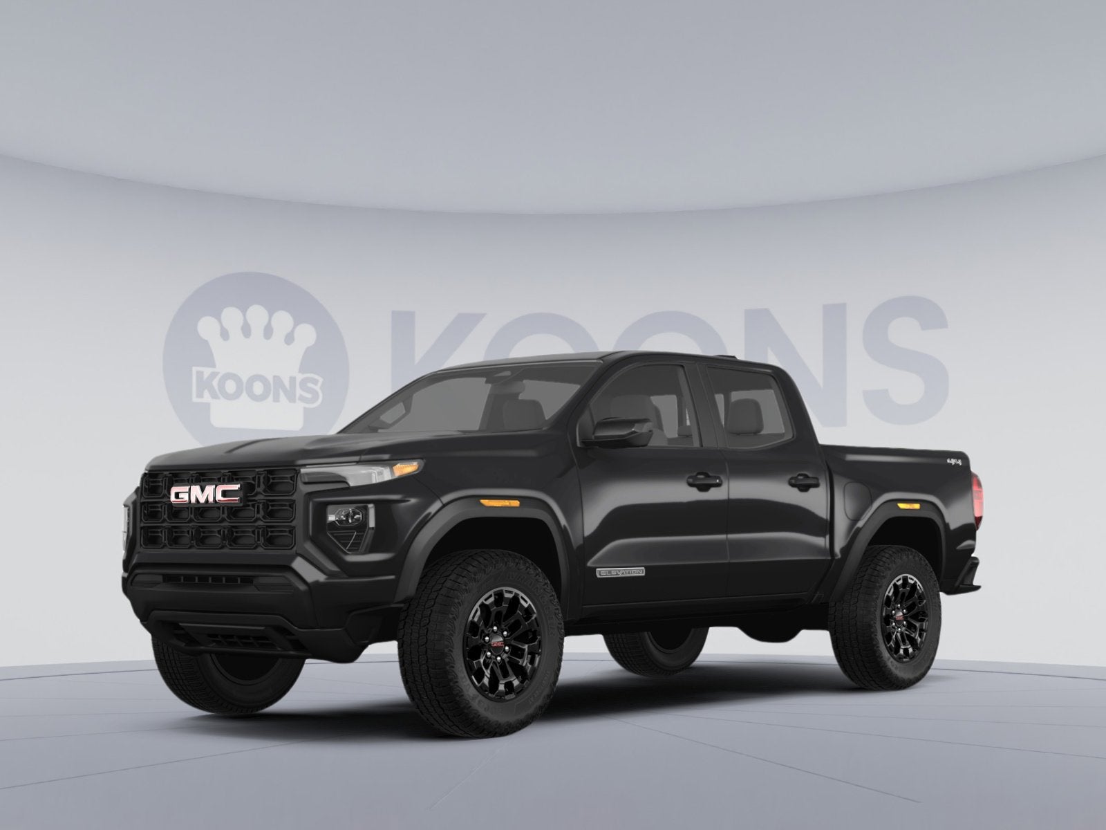 2026 GMC Canyon AT4 in Onyx Black — front three-quarter view