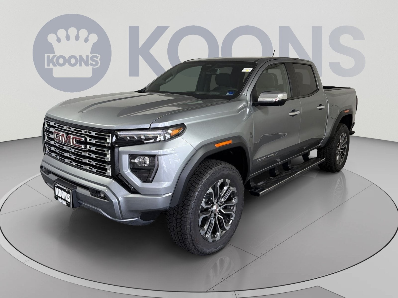 2026 GMC Canyon Denali in Sterling Metallic — front three-quarter view