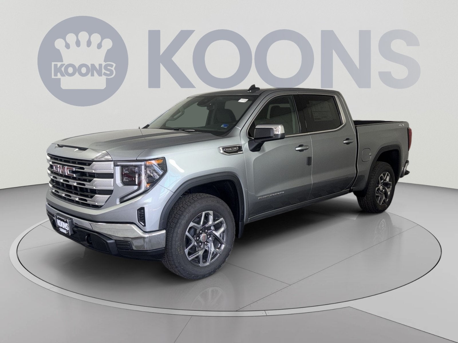 2026 GMC Sierra 1500 SLE in Sterling Metallic — front three-quarter view