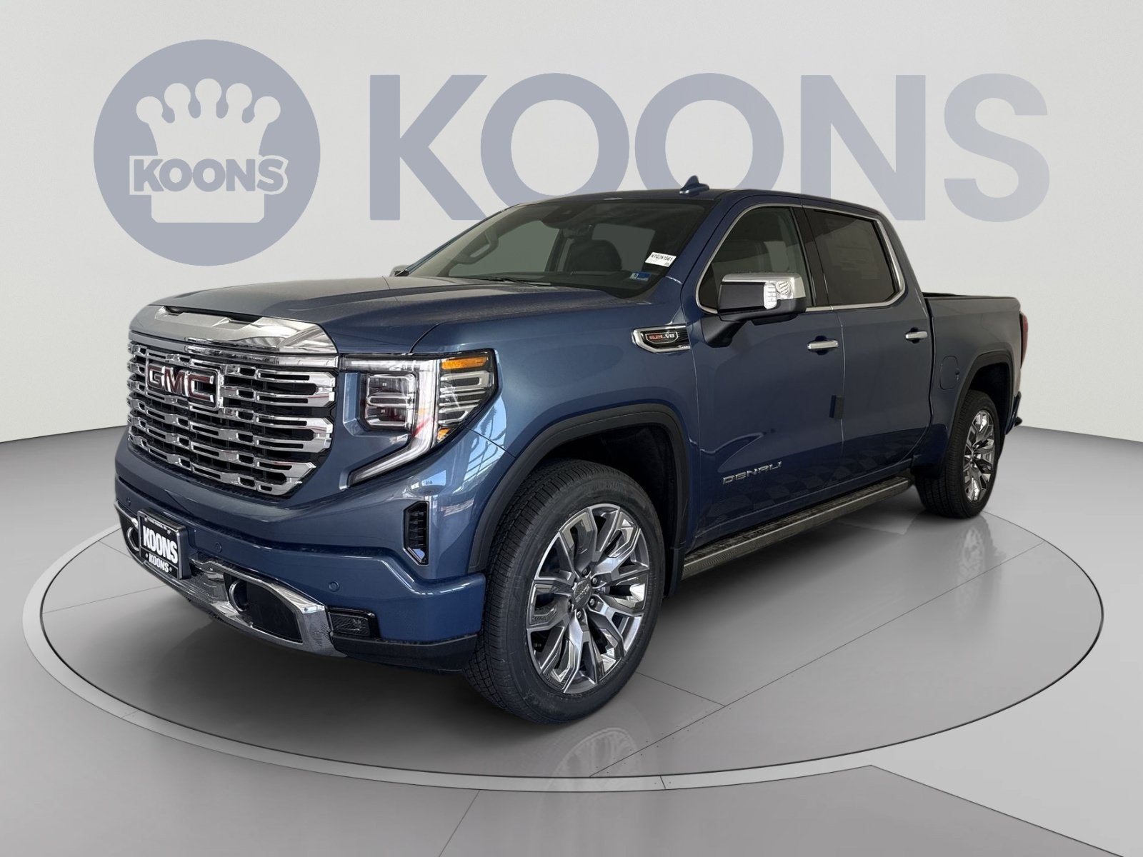 2026 GMC Sierra 1500 Denali in Downpour Metallic — front three-quarter view