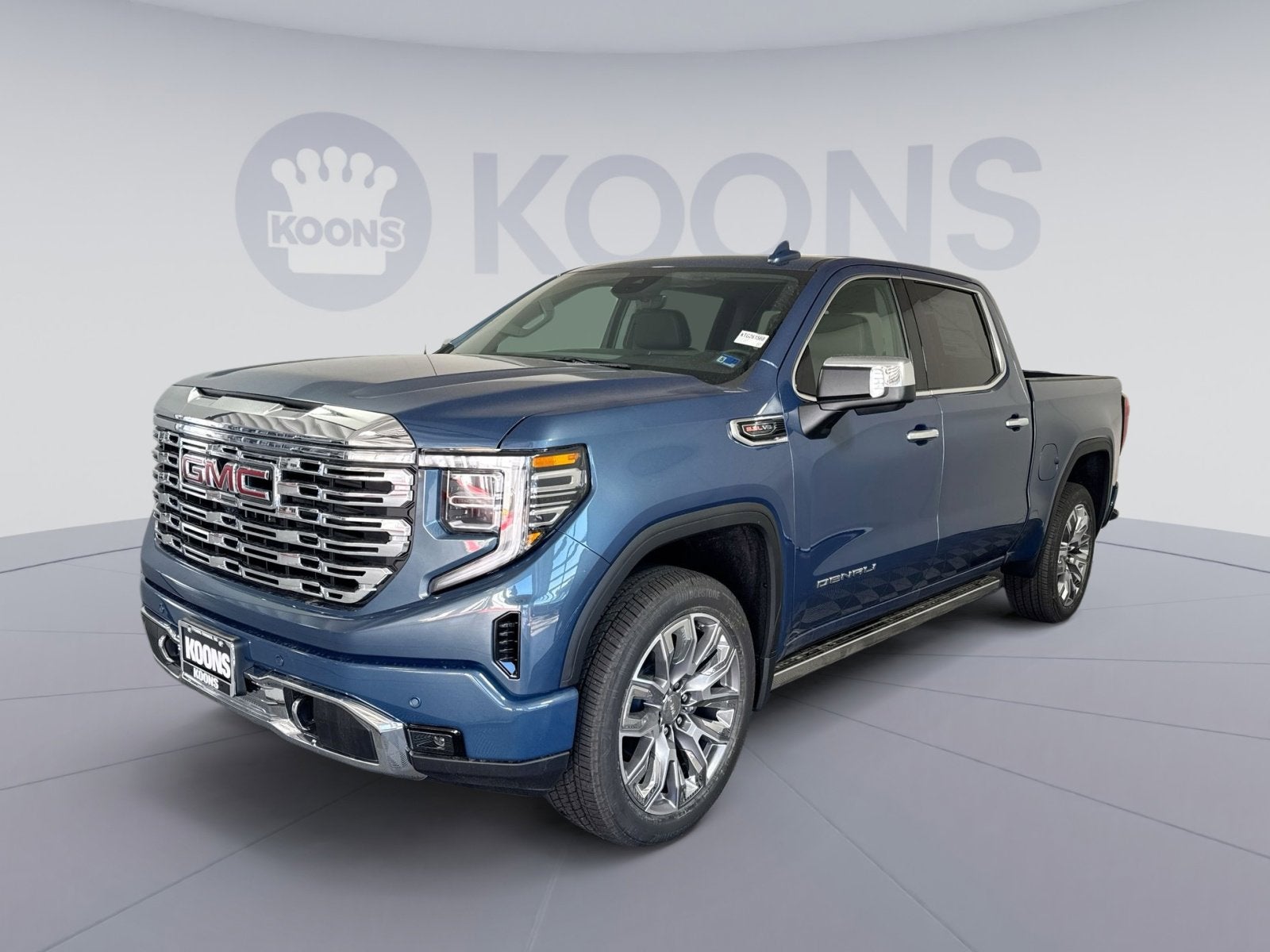 2026 GMC Sierra 1500 Denali in Downpour Metallic — front three-quarter view