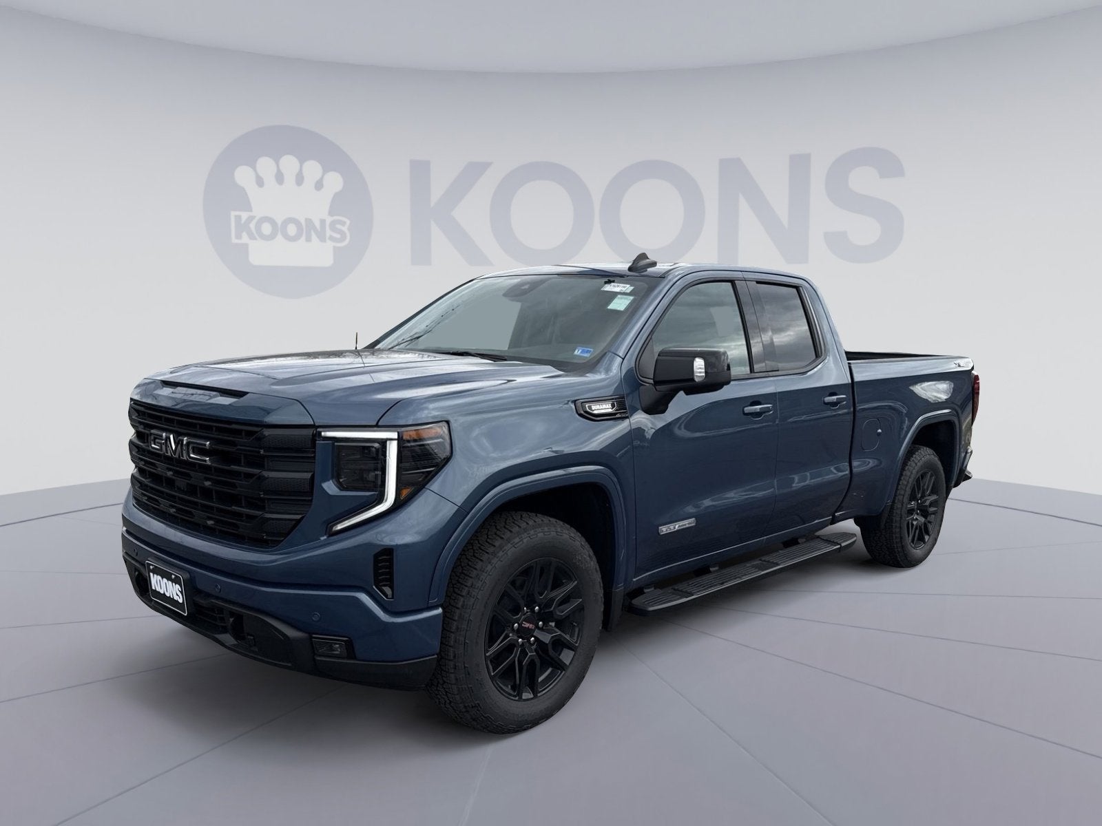 2026 GMC Sierra 1500 Elevation in Downpour Metallic — front three-quarter view