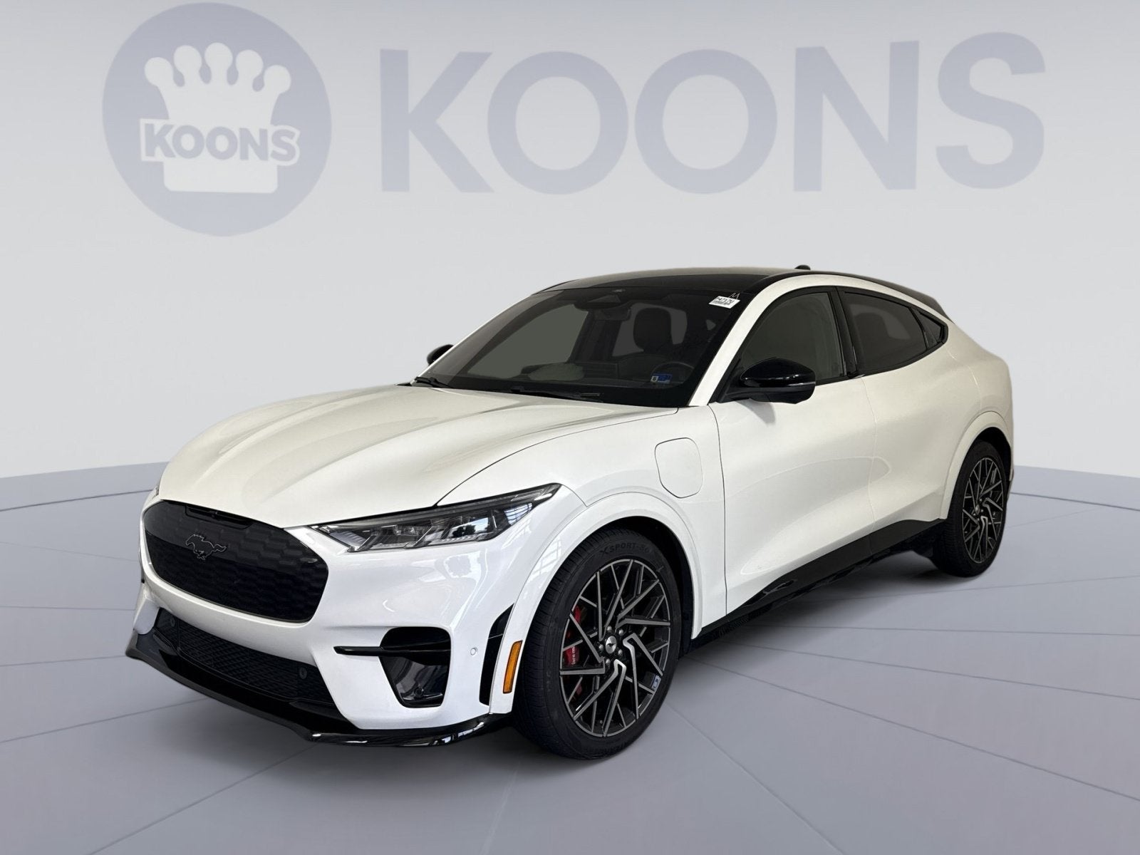 2021 Ford Mustang Mach-E GT in White Metallic — front three-quarter view