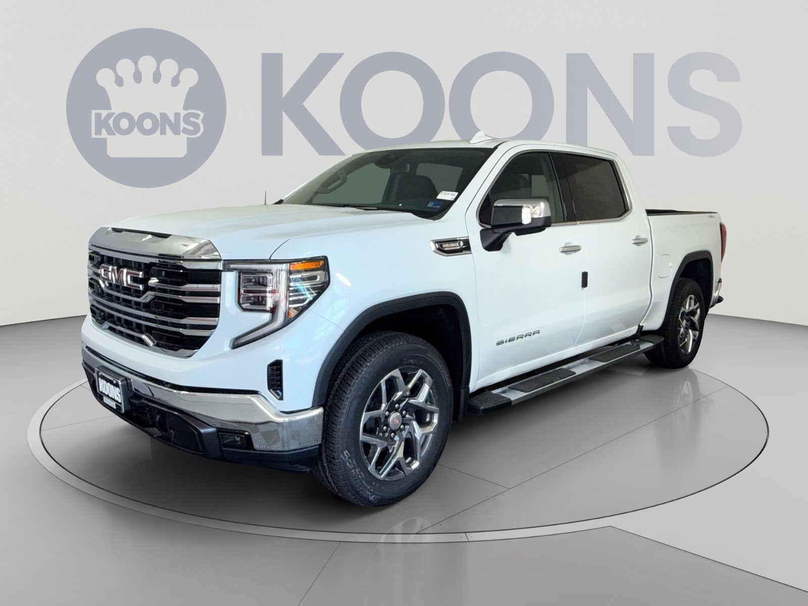 2026 GMC Sierra 1500 SLT in Glacier White Tricoat — front three-quarter view