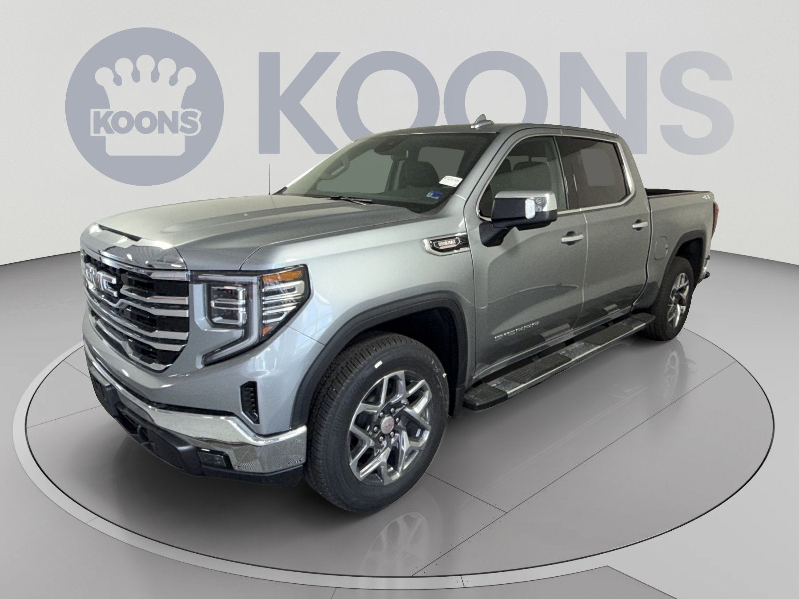 2026 GMC Sierra 1500 SLT in Sterling Metallic — front three-quarter view