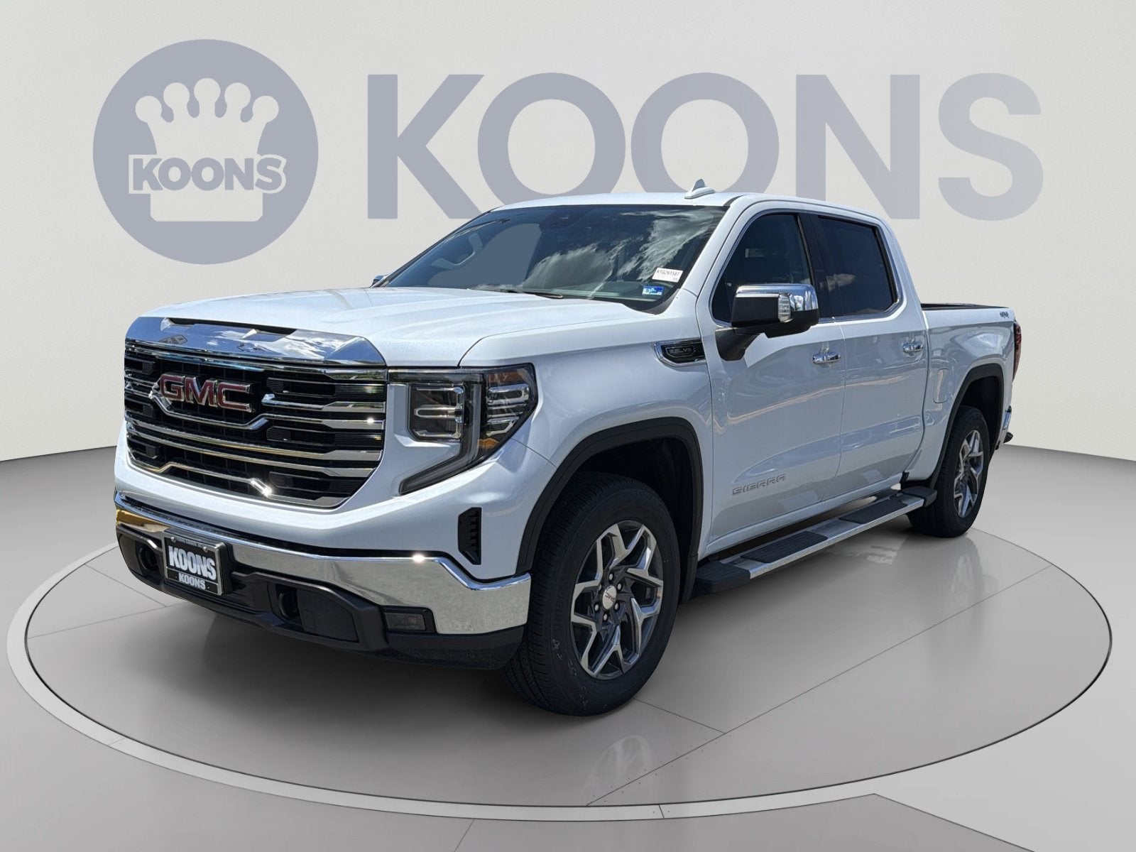 2026 GMC Sierra 1500 SLT in Glacier White Tricoat — front three-quarter view