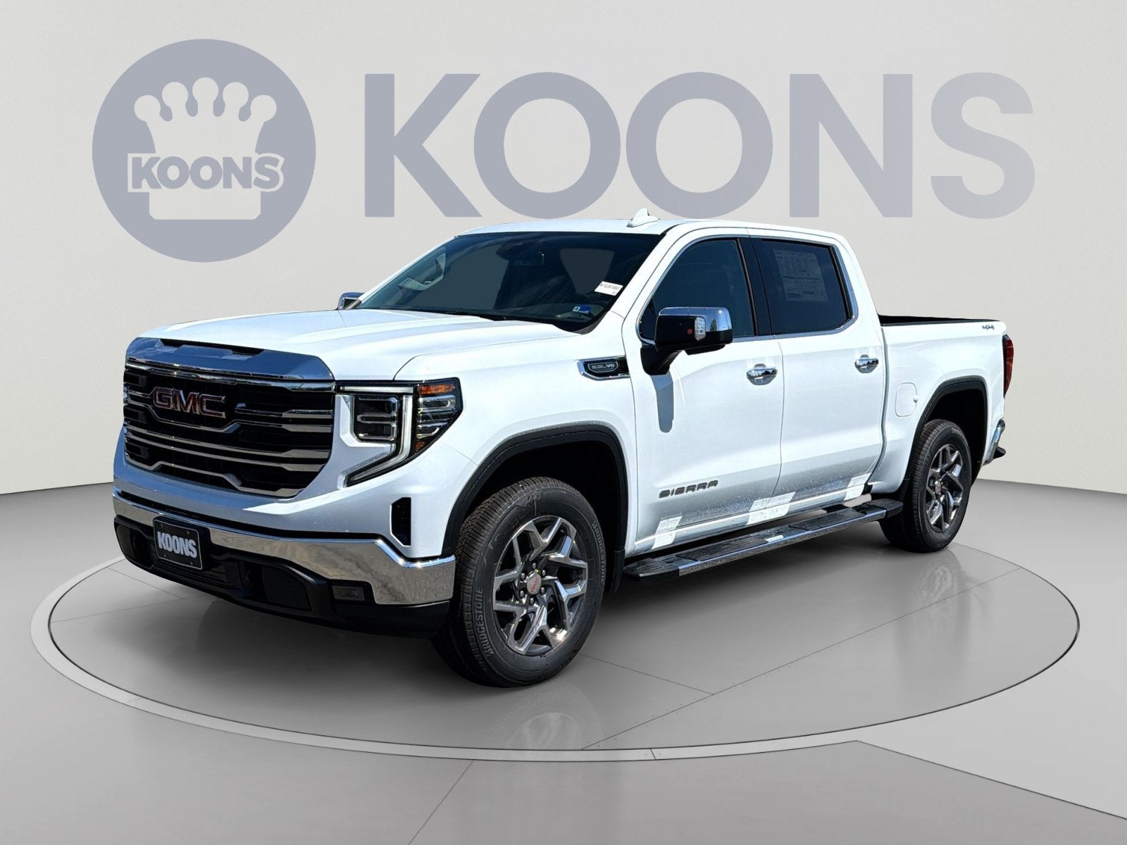 2026 GMC Sierra 1500 SLT in Glacier White Tricoat — front three-quarter view