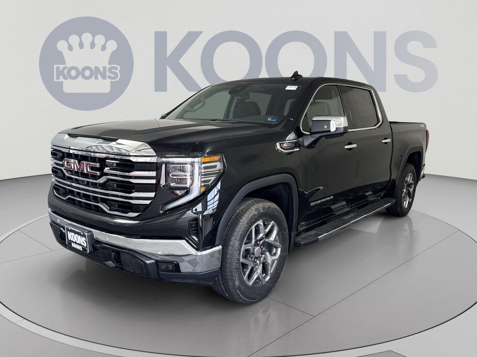 2026 GMC Sierra 1500 SLT in Onyx Black — front three-quarter view