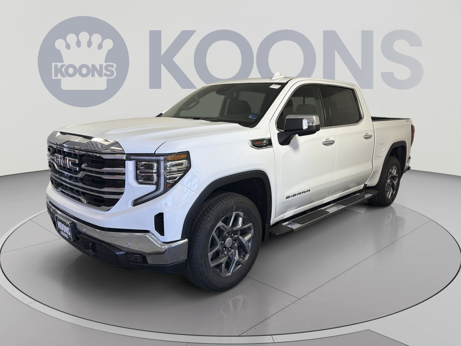 2026 GMC Sierra 1500 SLT in Summit White — front three-quarter view