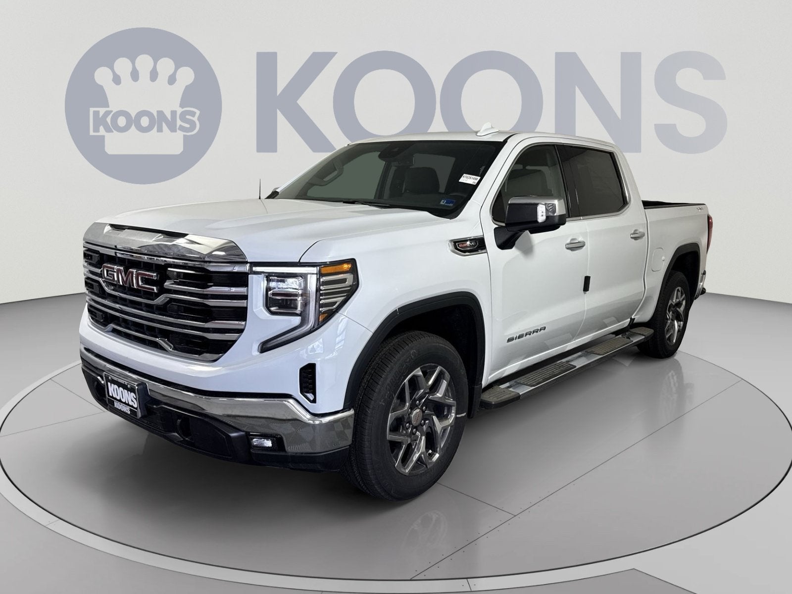 2026 GMC Sierra 1500 SLT in Glacier White Tricoat — front three-quarter view