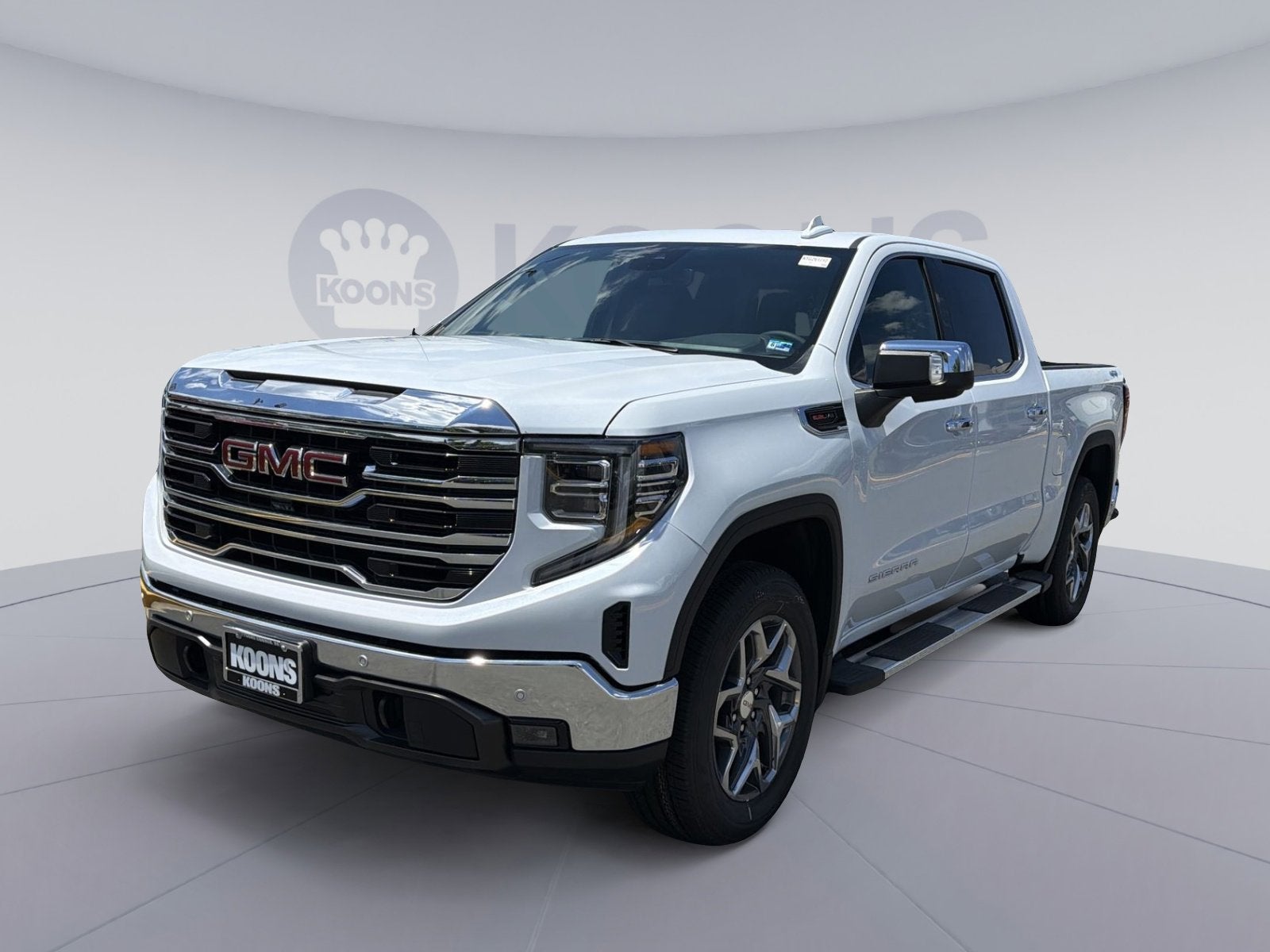 2026 GMC Sierra 1500 SLT in Glacier White Tricoat — front three-quarter view