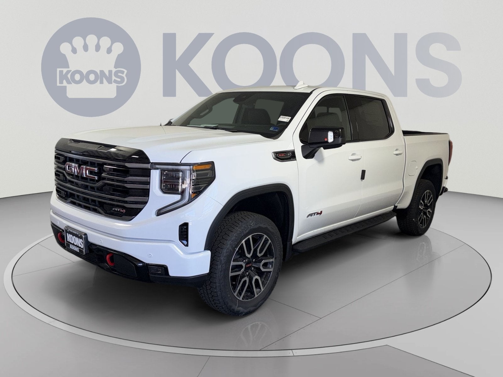 2026 GMC Sierra 1500 AT4 in Summit White — front three-quarter view
