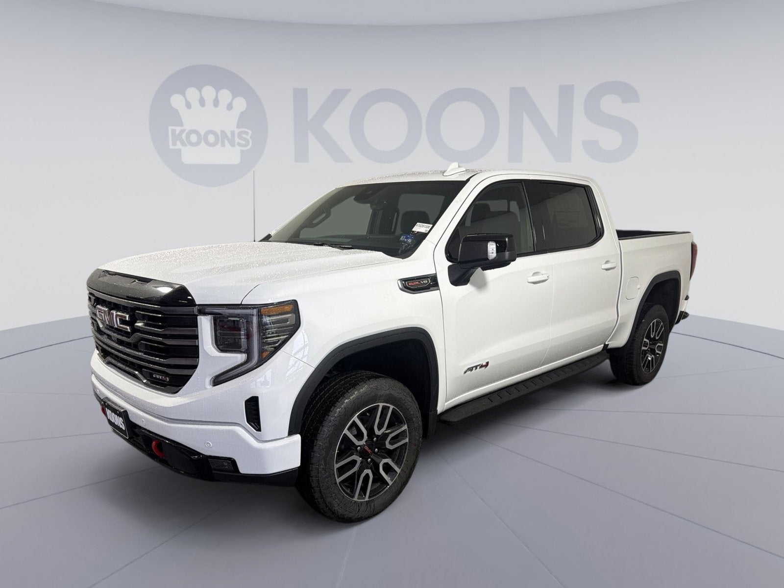 2026 GMC Sierra 1500 AT4 in Summit White — front three-quarter view