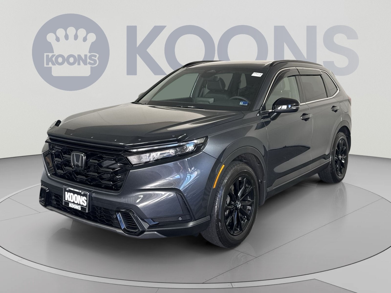 2024 Honda CR-V Hybrid Sport-L in Gray — front three-quarter view