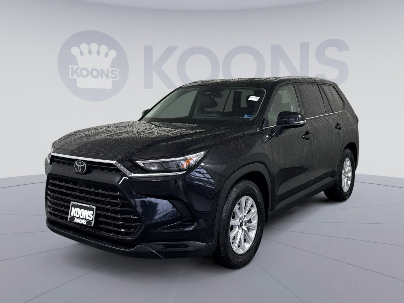 2024 Toyota Grand Highlander XLE in Midnight Black Metallic — front three-quarter view
