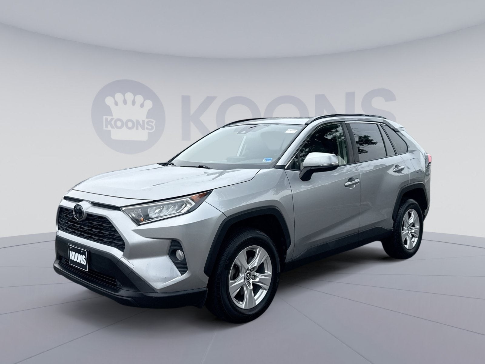 2019 Toyota RAV4 XLE in Silver Sky Metallic — front three-quarter view