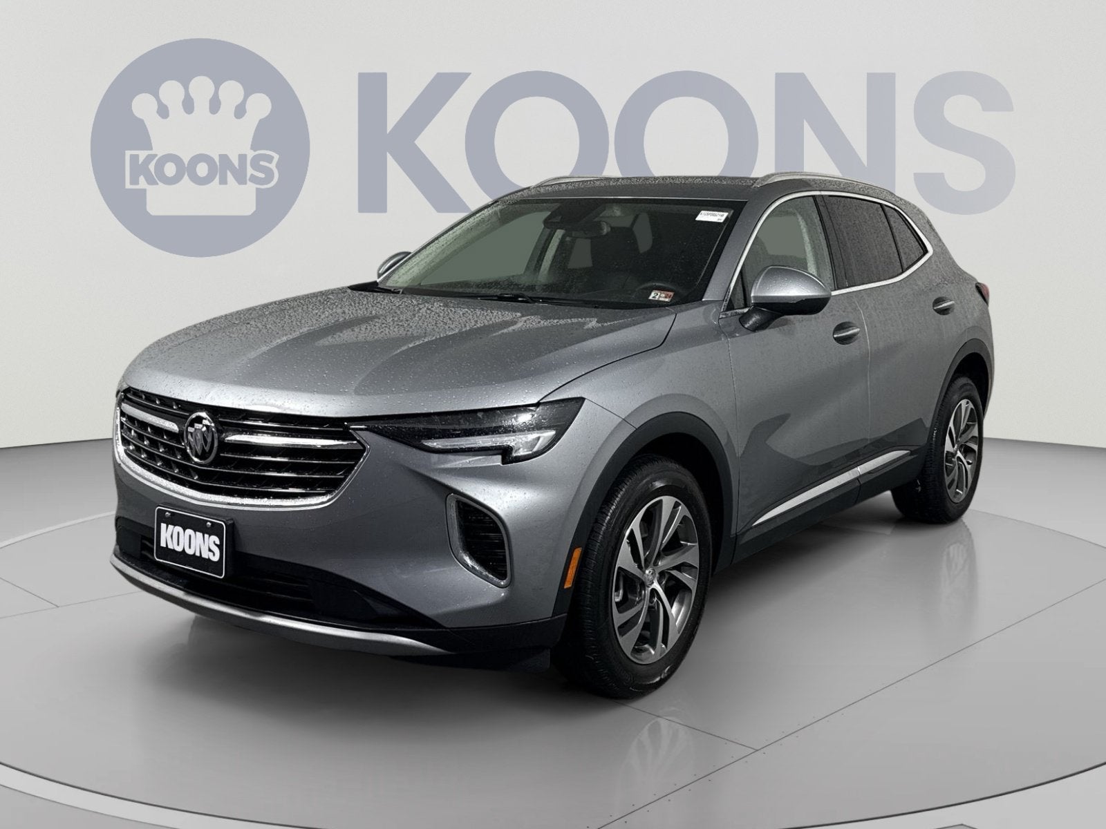 2023 Buick Envision Essence in Moonstone Gray Metallic — front three-quarter view