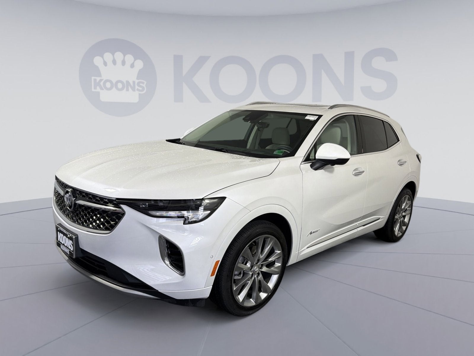 2023 Buick Envision Avenir in White Frost Tricoat — front three-quarter view