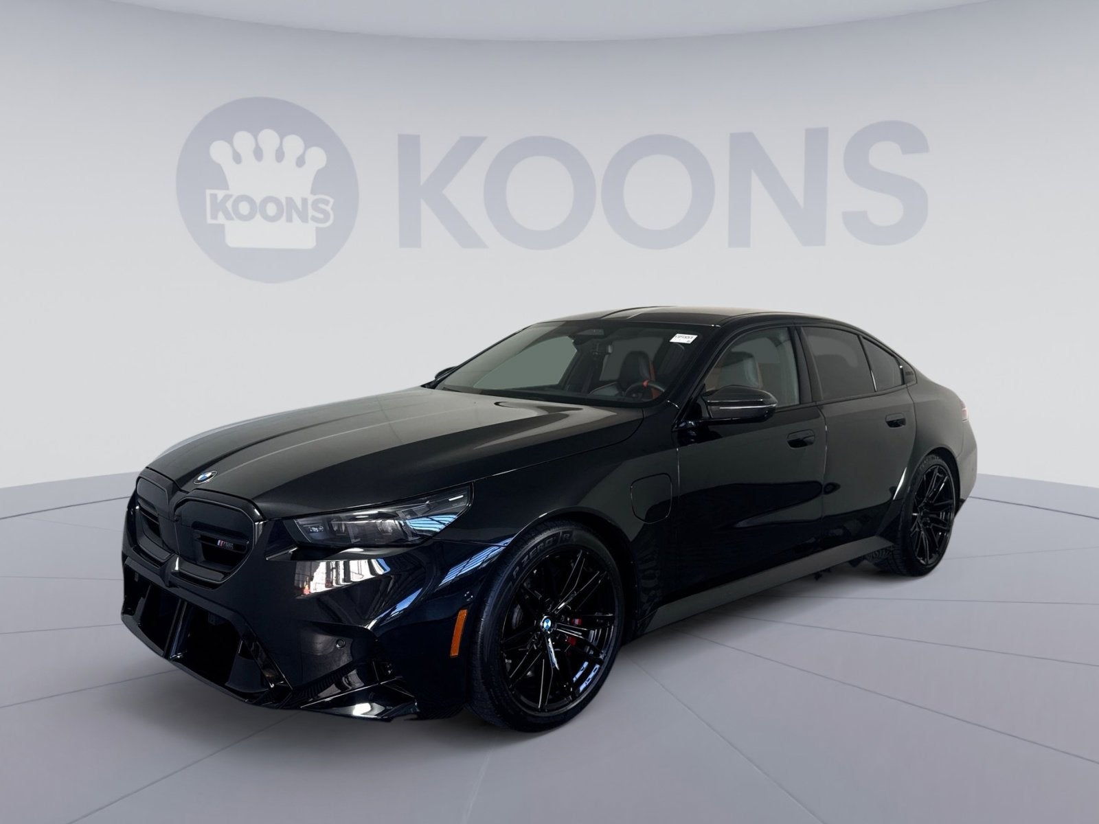 2026 BMW M5 Sedan in Black Sapphire Metallic — front three-quarter view