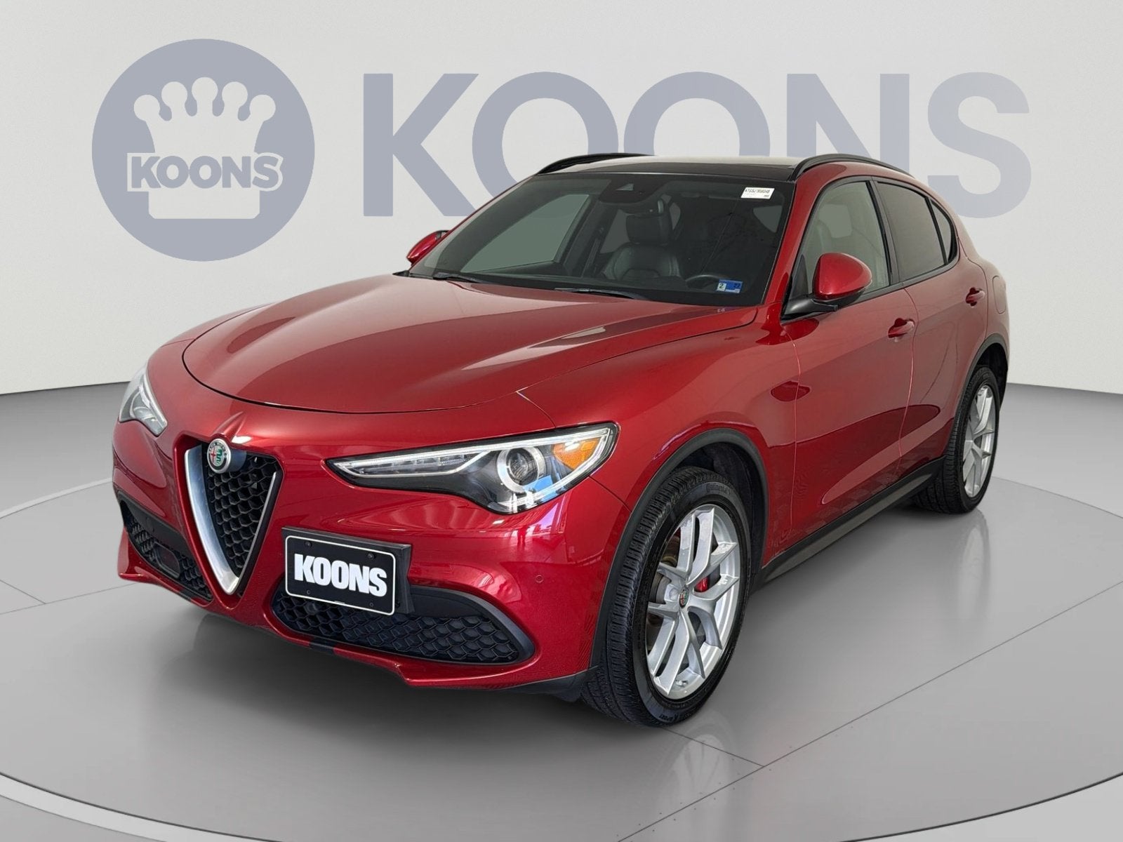 2018 Alfa Romeo Stelvio Ti Sport in Rosso Competizione Tri-Coat — front three-quarter view